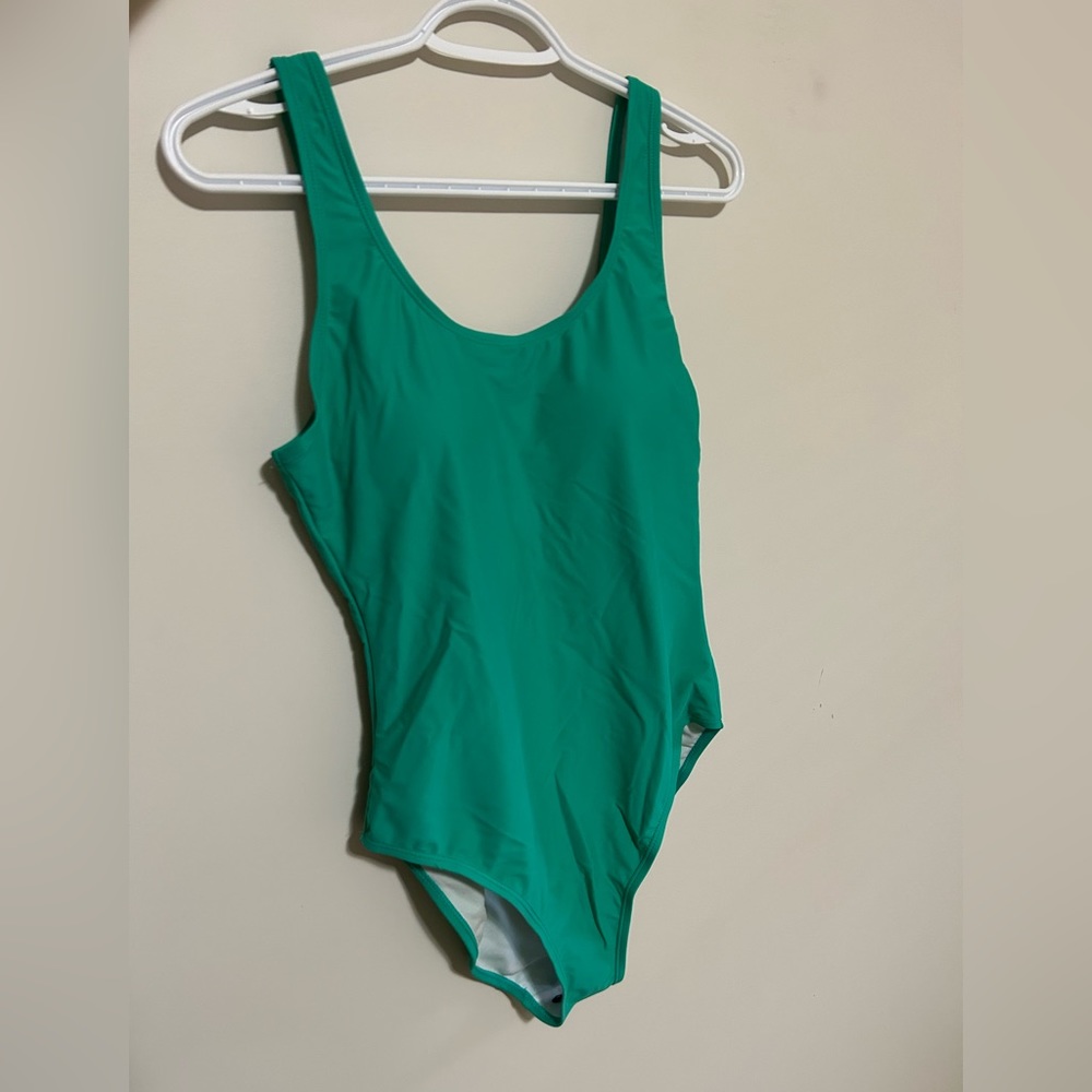 Women’s medium Sea Green Nicole Miller 1 piece scoop back swimsuit
